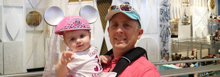 Dr. Darren Mollo and his daughter at Disney